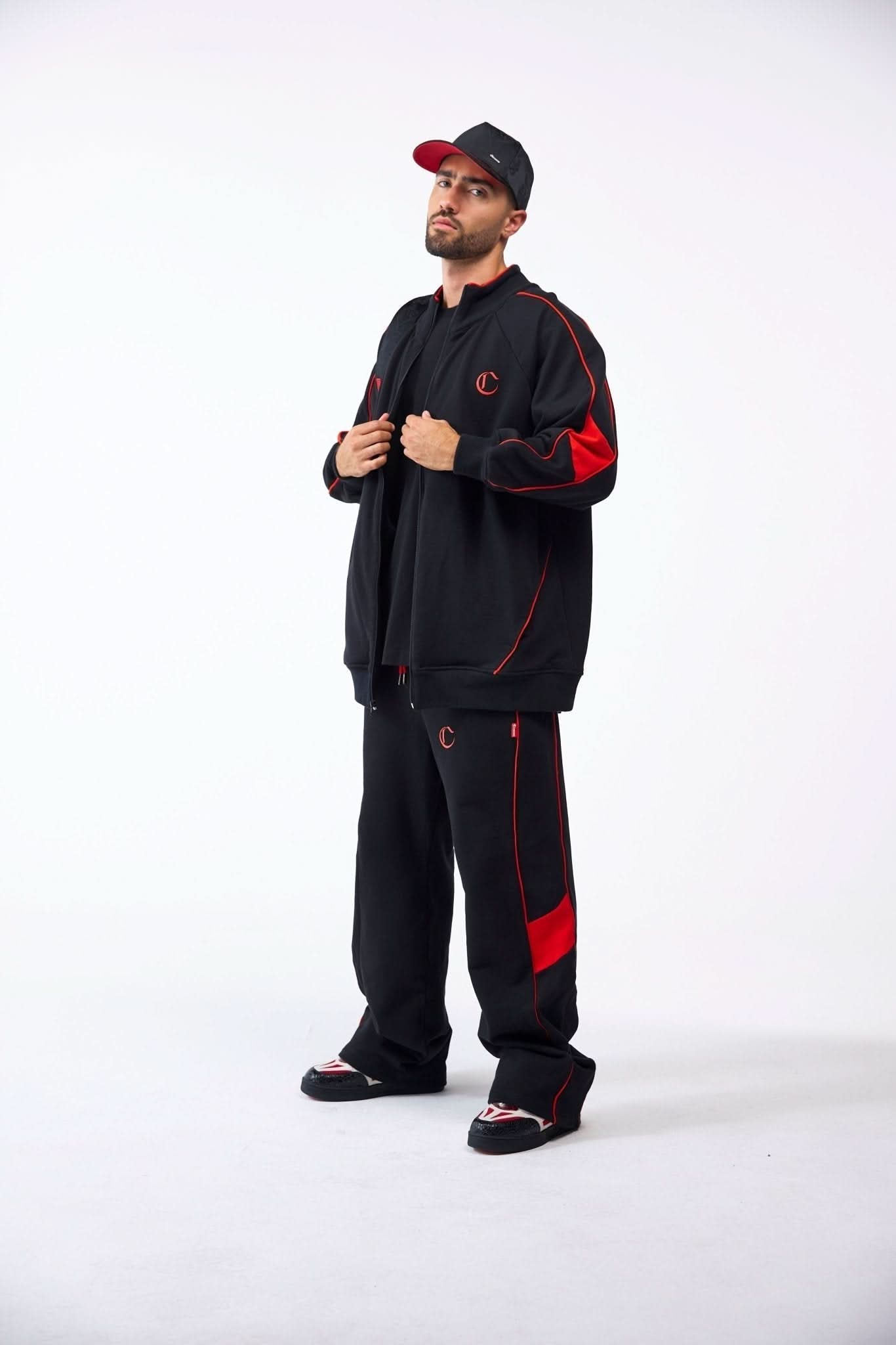 BUZO MASCULINO MUTO NEGRO/ROJO CLEMONT - CLEMONT.CO S.A.S.