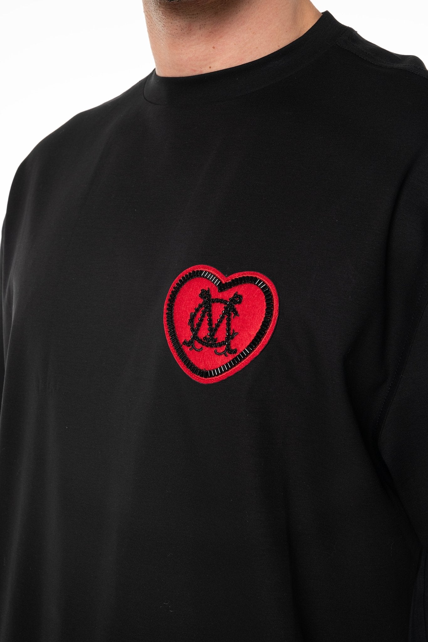 CAMISETA OVERSIZED MASCULINO ACCOGLIENZA NEGRO CLEMONT - Clemont Oficial